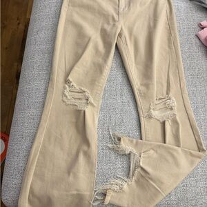 Women's Distressed Beige Flare Jeans